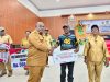 Meki Nawipa Serahkan 5 Milyar untuk pembangunan Gereja Katolik Paroki Kristus Kebangkitan Kita Damabagata Tigi Timur Deiyai