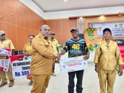 Meki Nawipa Serahkan 5 Milyar untuk pembangunan Gereja Katolik Paroki Kristus Kebangkitan Kita Damabagata Tigi Timur Deiyai